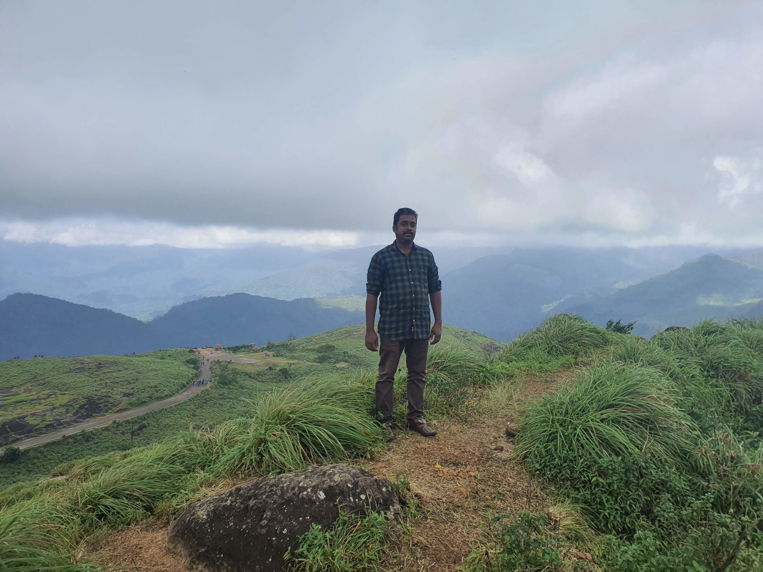 Misty mountain range in Ponmudi