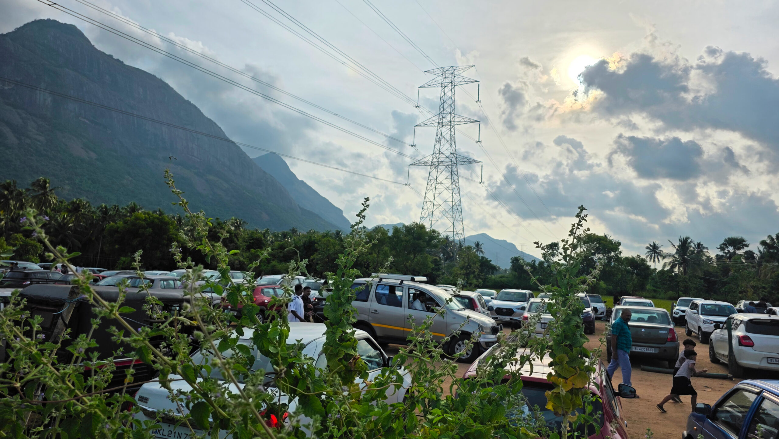 Vehicles parked near Kollengode park